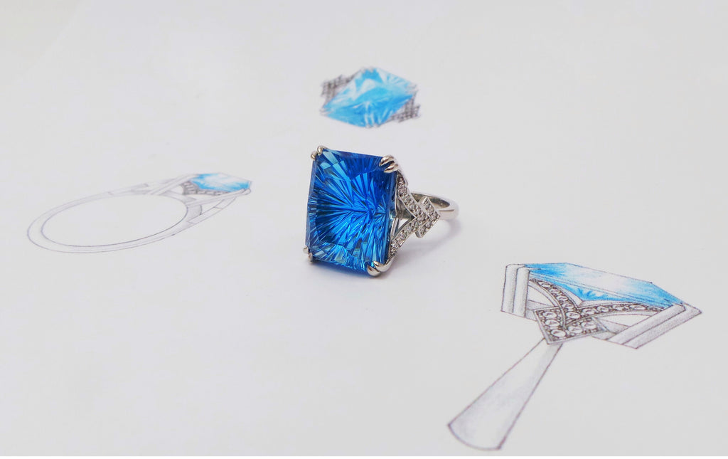 Cut with quality – our show-stopping Fantasy Cut Blue Topaz & Diamond Ring